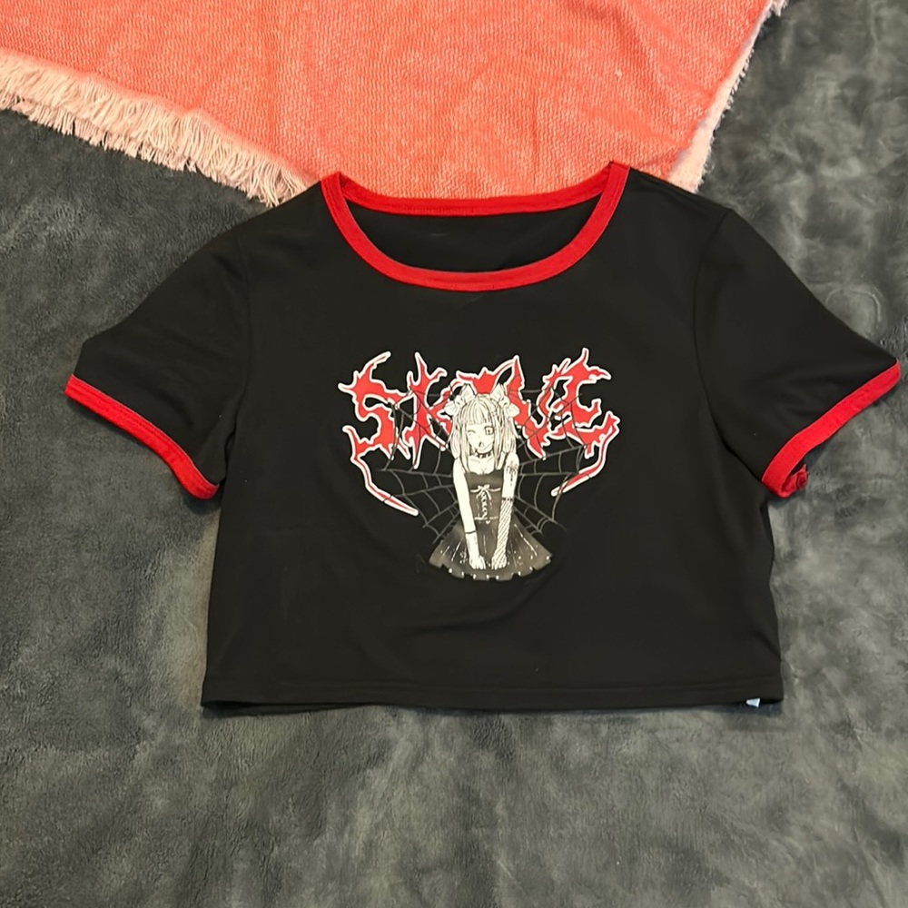 Worn a few times. Cropped anime girl shirt.